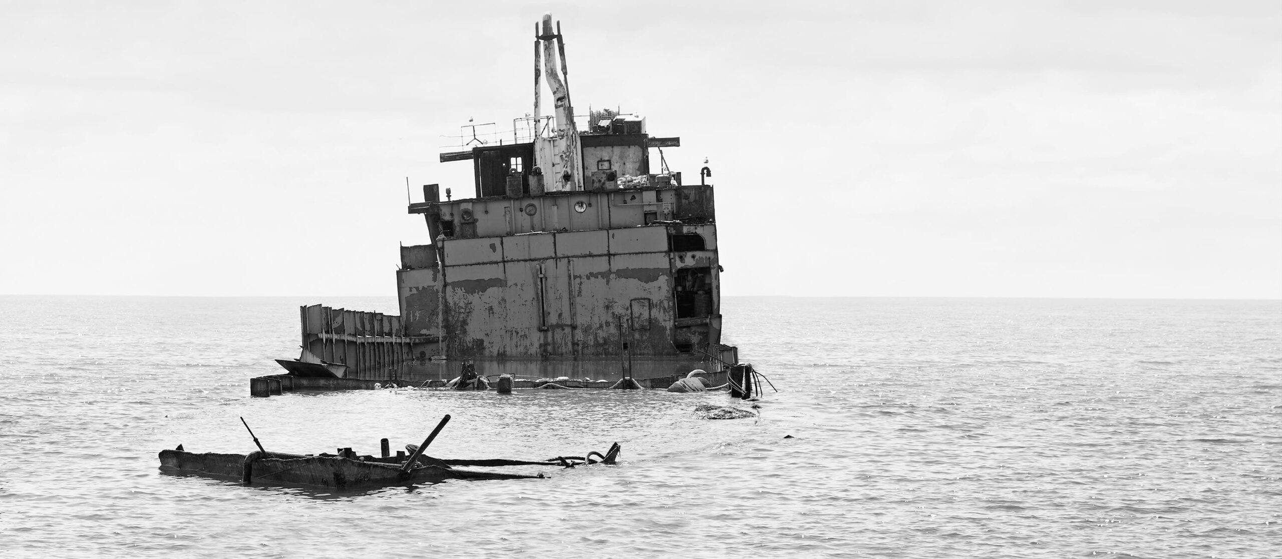 Wreck of a grounded merchant ship at sea